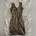 Elegant Black and Gold Sequin Dress Photo 3