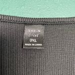 SheIn black skater dress featuring built-in shorts and hidden side pockets Photo 6