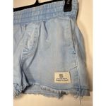 BDG  Anthropologie Denim Shorts High Smocked Waist Light Wash Raw Hem Size Small Photo 1
