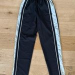 Noli  - Track Pants with Side Stripes & Split Hem in Black & Gray Photo 0