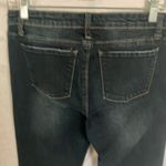 Tractr: Stretchy Skinny Jeans with red flannel covered holes Photo 9