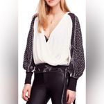 Free People  Auxton Thermal Wrap Top with a floral print Photo 7