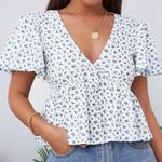 SheIn Ditsy Floral Peplum Top Photo 0