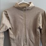 Pretty Little Thing Long Sleeve Tan Ribbed Bodysuit Photo 1