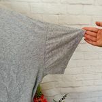 Woman Within Grey Tee Photo 2