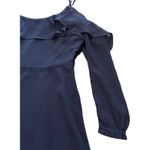 Cupcakes and Cashmere  Beautiful blue dress, cold shoulder, ruffle collar, sheer sleeves, dress is lined, adjustable straps, 100% polyester, excellent condition, size 0  Photo 7