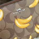 Coach Authentic Signature Coated leather BANANA zip top wristlet Photo 1