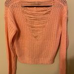 Discovery Teenbell Pink Distressed Sweater Photo 1