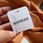 Free People ‎ Taupe Orange Puff Sleeve Tie Back Slim Top NWT Size Large Photo 4