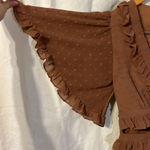 Saints + Secrets ‘Swiss Dot’ Ruffle Dress with Side Cut Outs and Deep Vneck Photo 2