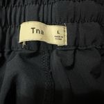 Aritzia TNA speed jogger navy, red, and white stripe size large Blue Photo 1