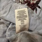 Free People  Speak Easy light blue floral v-neck bell-sleeve top size S Photo 9