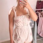 Champagne Sisters Collection Spring White Floral Romper Photo 2