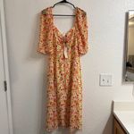 BCBGeneration size 12 SHORT PUFF SLEEVE MIDI DRESS IN BLURRED BUTTERCUP Photo 1