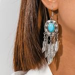 Boho silver feather earrings with turquoise stone Photo 1