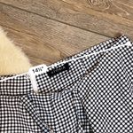 Storia Black Checkered Ruffle Shorts Photo 2