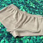 Gapfit tan running shorts, two pockets, stretchy Photo 1