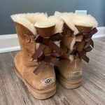 UGG women’s bailey bow tan  boots Photo 1