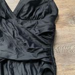 Jaclyn Smith Elegant Black Halter Swimsuit Photo 1