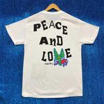 Urban Outfitters Keith Haring Peace and Love White Graphic T-Shirt Size Medium Photo 1