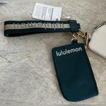 Lululemon NWTS  Dual Pouch Wristlet Wordmark Photo 2