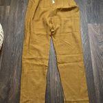 Kittenish  Gold Pleated Pants Photo 0