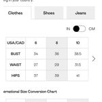 Nasty Gal Belted Detail Puff Sleeve Flared Jumpsuit Photo 9