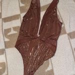 Victoria's Secret Bodysuit Photo 0