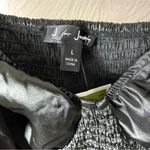 J for Justify  top Photo 1