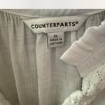Counterparts  White Women's Top Photo 1