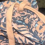 Free People Movement Zephyr Printed Pants Camel Combo Size Large NWOT Photo 9