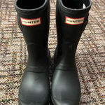 Hunter Boots Black Hunter rain boots #rainydays Stylish black rain boots by Hunter. Durable and waterproof. Perfect for wet weather. Photo 0