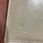Gucci  Embossed  Leather Compact Wallet Photo 11