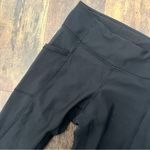 Lululemon  Size 6 Black Tight Stuff Legging Reflective Dots At Ankles Pockets Photo 3
