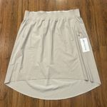 Athleta  Cosmic Skirt Womens XL Knee Length Modest Athletic Beige Pockets NEW Photo 0