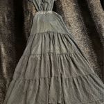 Altar'd State flowy, A-line maxi dress with a tiered skirt and a deep V-neckline or open-back design. Photo 1