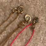 Juicy Couture NWOT Triple Charm Chain Necklace Photo 2