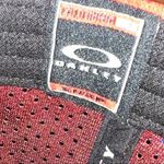 Oakley  red air ventilation and adjustable snap back closure Nwot Photo 3