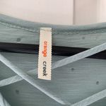 Orange Creek New without tags, , T-shirt with holes and cross neckline, Mint Photo 1