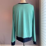 Truly Madly Deeply UO  long sleeve pullover green with dark blue trim Size Medium Photo 2