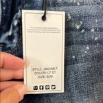 Judy Blue  Ripped Cropped Jeans in Dark Wash Photo 1