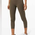 Lululemon Invigorate HR Crop 23” size 2 in dark olive Photo 0