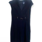 Trina Turk black dress with belt buckle detail Photo 0