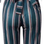 Sit Pretty And Apply Pressure Jumpsuit Green Photo 1