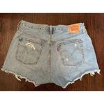 Levi's  High Rise Light Wash Distressed Denim Jeans Size 33 Photo 1