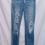 American Eagle  Medium Wash Next Level Stretch Mid Rise Distressed Jegging Jean Photo 0