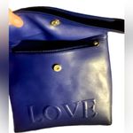LOVE Backpack Purse Royal Blue Bendover the top & snap closure. Photo 3