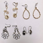 4 pairs of feminine lightweight earrings 2 goldtone and 2 silvertone Silver Photo 0
