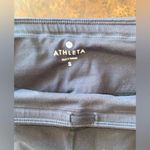 Athleta Cropped Leggings w/ Back Zip Pocket & Mesh Panels in black - size small Photo 2