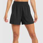 Gymshark  WOVEN POCKET SHORTS size medium in black Photo 0